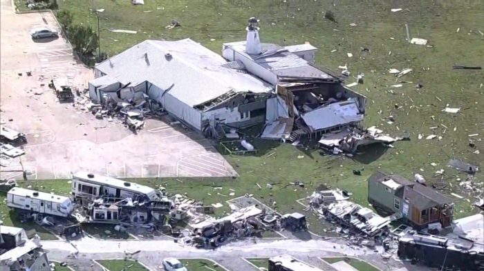 Tornadoes and storms leave at least 18 dead in central US 