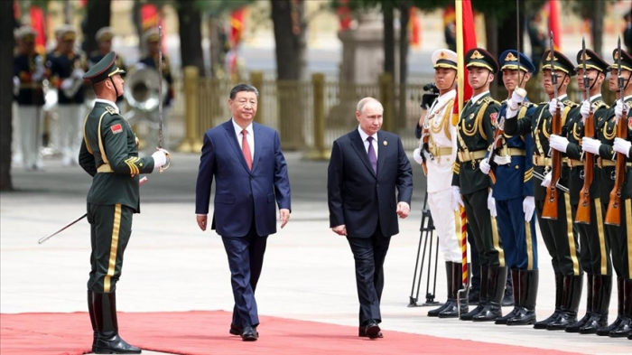 China-Russia relations contribute to global stability, Xi tells Putin