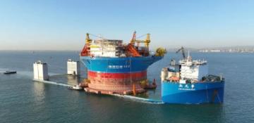 HAI KUI No.1 smoothly loaded on XIN GUANG HUA for delivery 