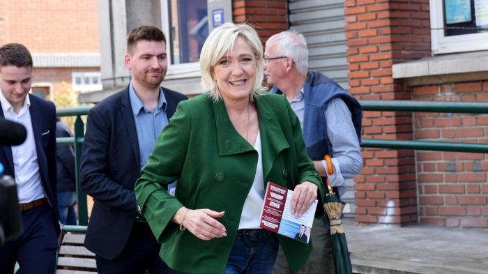 France's far-right leads ahead of early election polls, surveys show 