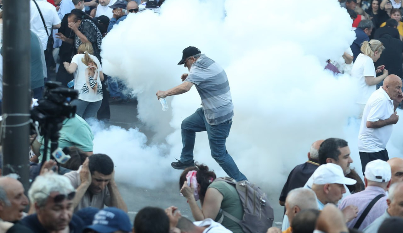 Over 100 injured after protesters clash with police outside Armenian parliament 