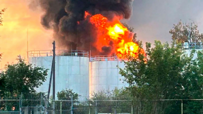 Russian oil depot catches fire after being struck by Ukrainian drone 