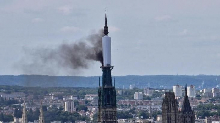 Spire of France's Rouen cathedral in flames -  VIDEO 