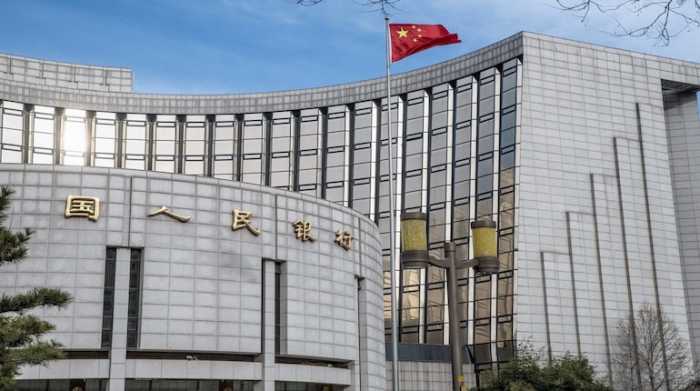 China's central bank holds rate steady, limits stimulus