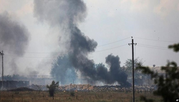 Russian munitions depot catches fire after Ukraine drone strike