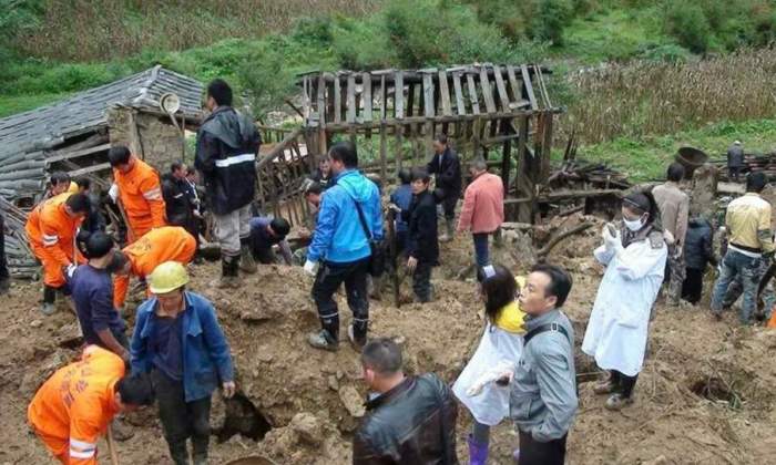 At least 12 dead after rain-triggered landslide in central China