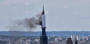 Spire of France's Rouen cathedral in flames -  VIDEO 