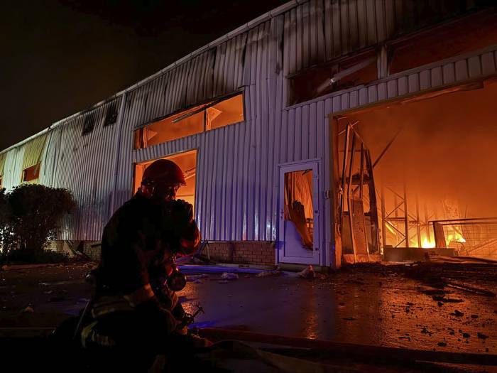 Ukraine emergency workers extinguish fire in grain warehouse in Odesa region 