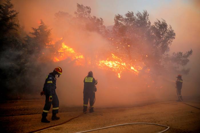 Greece requests EU assistance as wildfires approach Athens suburbs 