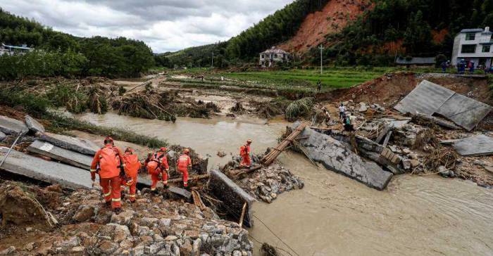 Typhoon-triggered heavy rains kill at least 50 in central China 