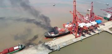Massive explosion hits container ship at Chinese port