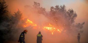 Greece requests EU assistance as wildfires approach Athens suburbs 