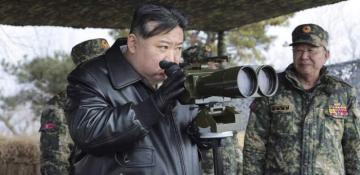 North Korea's Kim oversees test-firing of upgraded rocket launcher 