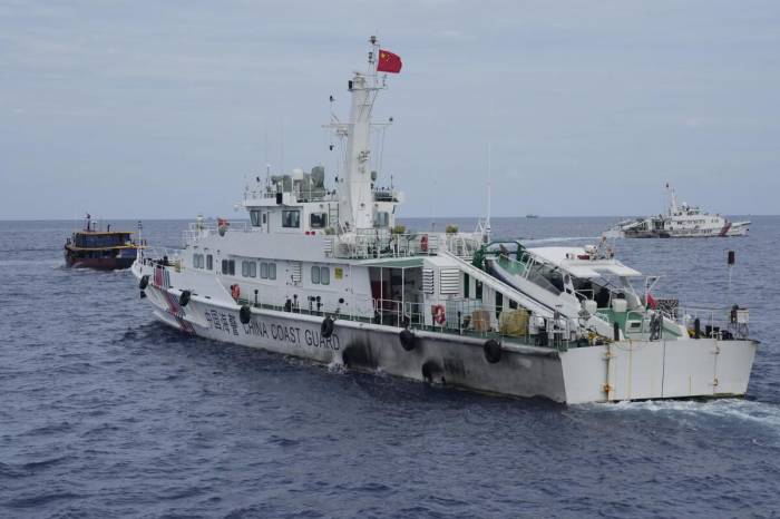 China pledges to defend its rights in South China Sea 