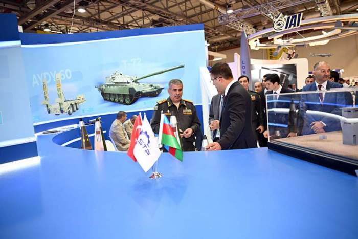 Azerbaijan's Defense Minister reviews military equipment at ADEX exhibition 