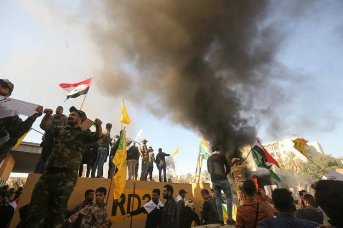 Iraqi faction threatens attacks on UAE if regional war erupts 