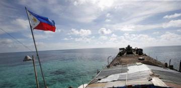 Philippines withdraws coast guard vessel from South China Sea shoal 