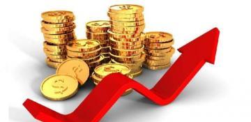 Gold rises slightly as investors watch U.S. data for rate clues