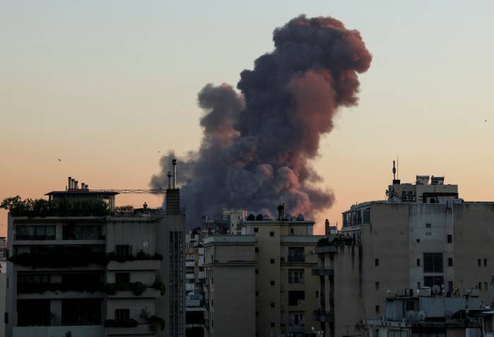 Israel reports additional strikes on Hezbollah targets in Beirut area 