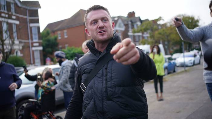 British activist Tommy Robinson jailed for defaming Syrian refugee schoolboy