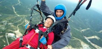 Centenarian from Russia’s North Caucasus becomes world’s oldest paramotor passenger at 104 