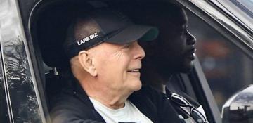 Bruce Willis spotted smiling on car outing after dementia diagnosis