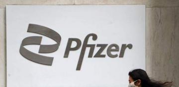 Pfizer and Arcadium Lithium rise premarket; Apple, Amazon and Netflix fall 