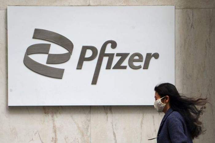Pfizer and Arcadium Lithium rise premarket; Apple, Amazon and Netflix fall 