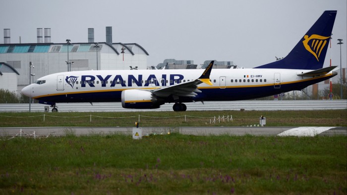 Ryanair reports declining profits, lowers passenger growth forecast