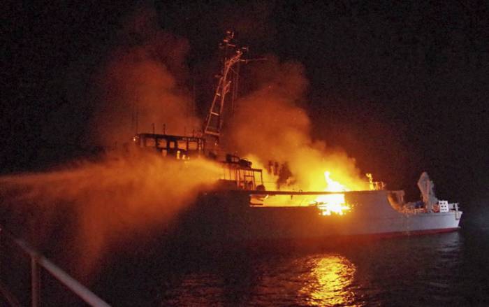 Japanese navy minesweeper sinks after fire off southwestern coast