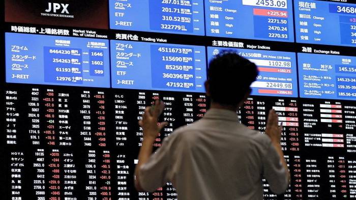 Asian stocks rise; dollar set for 8th consecutive weekly gain