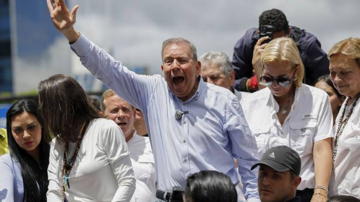 Venezuela threatens arrest of exiled opposition leader if he returns