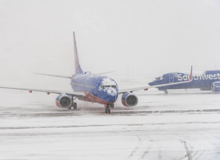 Winter storms disrupt Thanksgiving travel with over 1,400 flight delays across US -  VIDEO 