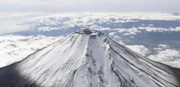 Snow spotted on Mount Fuji after record absence