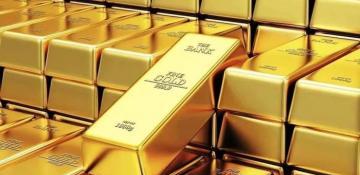 Gold recovers after decline, boosted by strong dollar