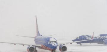 Winter storms disrupt Thanksgiving travel with over 1,400 flight delays across US -  VIDEO 