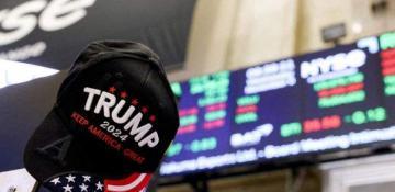 Wall Street hovers near record high as Trump-fueled rally continues 