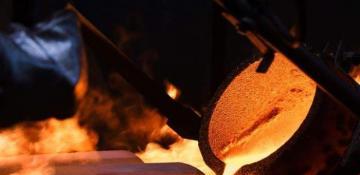 Gold prices edge higher on Trump tariff threat; Dollar rally limits gains 