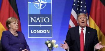 Merkel criticizes big business's influence on Trump 