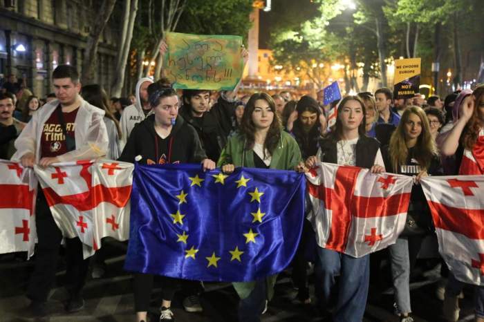 Georgia’s opposition stages a march challenging the results of the parliamentary elections