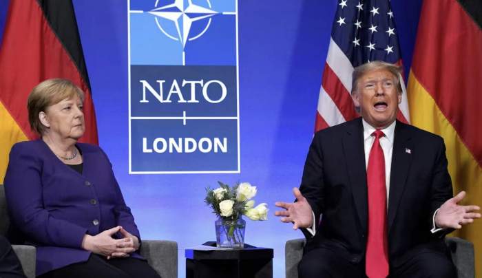 Merkel criticizes big business's influence on Trump 