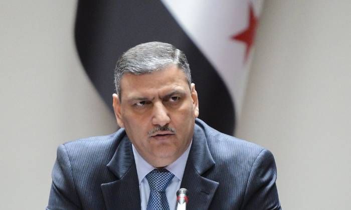 Ex-Syrian PM Hijab could head transitional government - media