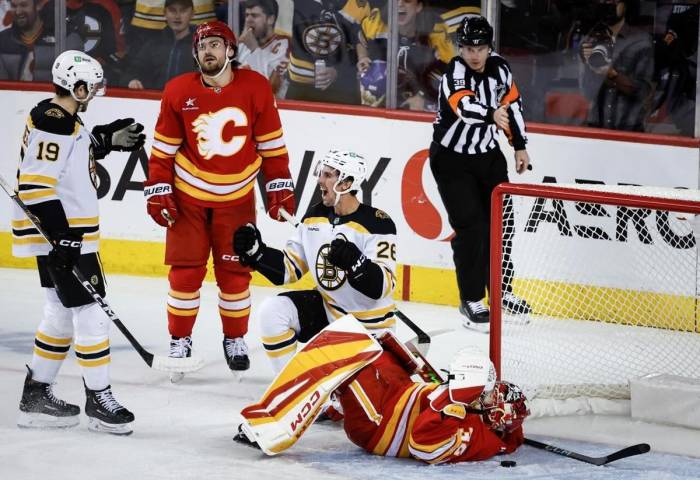 NHL: Pastrnak's OT goal powers Bruins to 4-3 comeback win over Flames