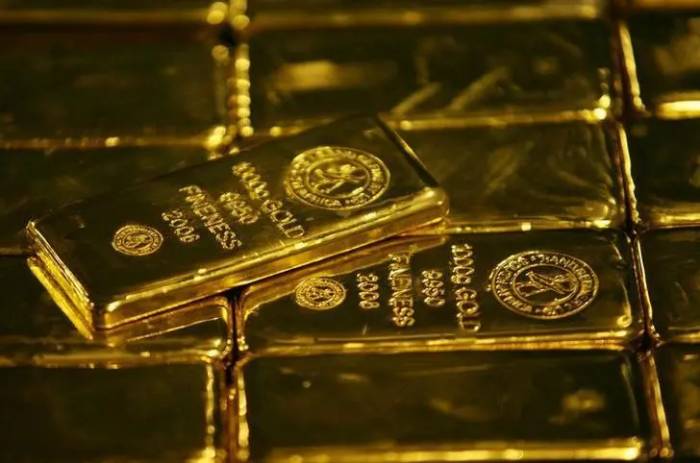 Gold prices steady but set for weekly losses on hawkish Fed outlook 