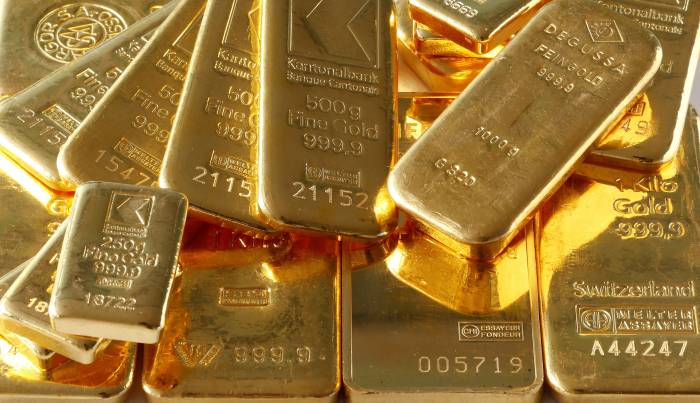 Gold prices rise slightly as investors await US rate outlook 