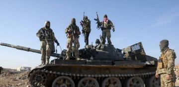 Syrian army pulls back as rebels seize Hama city