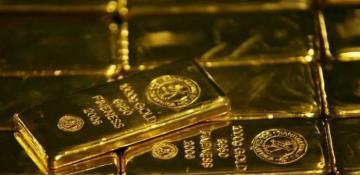 Gold prices steady but set for weekly losses on hawkish Fed outlook 