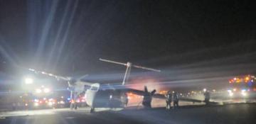 Air Canada plane narrowly avoids disaster as wing catches fire during landing -  VIDEO 