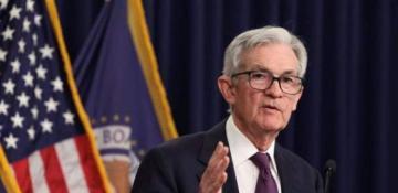 Fed lowers rates but sees fewer cuts next year due to stubbornly high inflation