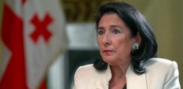 The Georgian president has called for the appointment of snap elections within a week 